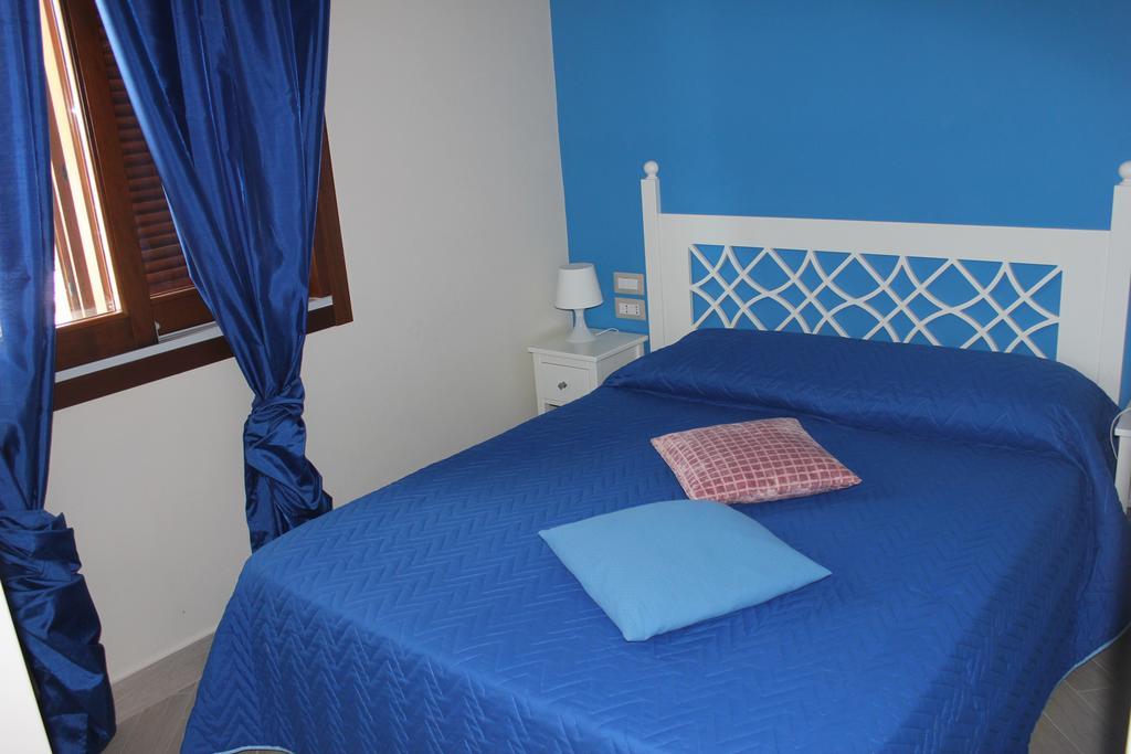 Holiday Lodge Al Porto Mattinata Bagian luar foto