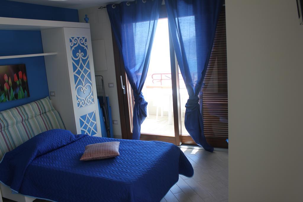 Holiday Lodge Al Porto Mattinata Bagian luar foto